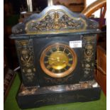 Victorian marble mantle clock with movement striking on a gong and have applied brass classical