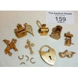 9ct gold charms for bracelet, inc. a Stanhope Lords prayer church charm, a wishing well, ship's