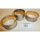 Three hallmarked silver napkin rings, approx. weight 58g