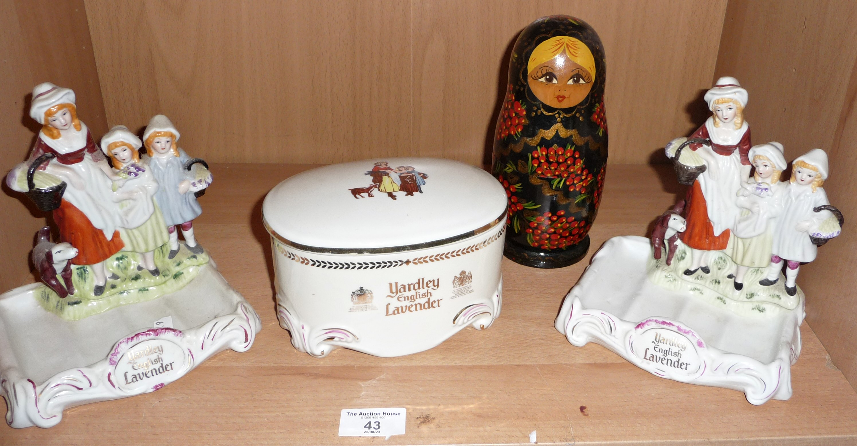 Two Yardley china soap dishes, a similar soap box and a painted Russian Matryoshka doll