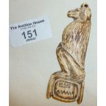 Ancient Egyptian carved cow bone funerary amulet in the form of Thoth as a seated baboon. With