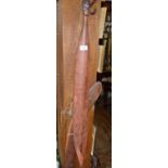 Tribal Art: Australian aboriginal woomera in red ochre and having gum handle, 3ft long. Together