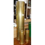 One large and two smaller WW1 brass shell cases, taller approx. 72cm high
