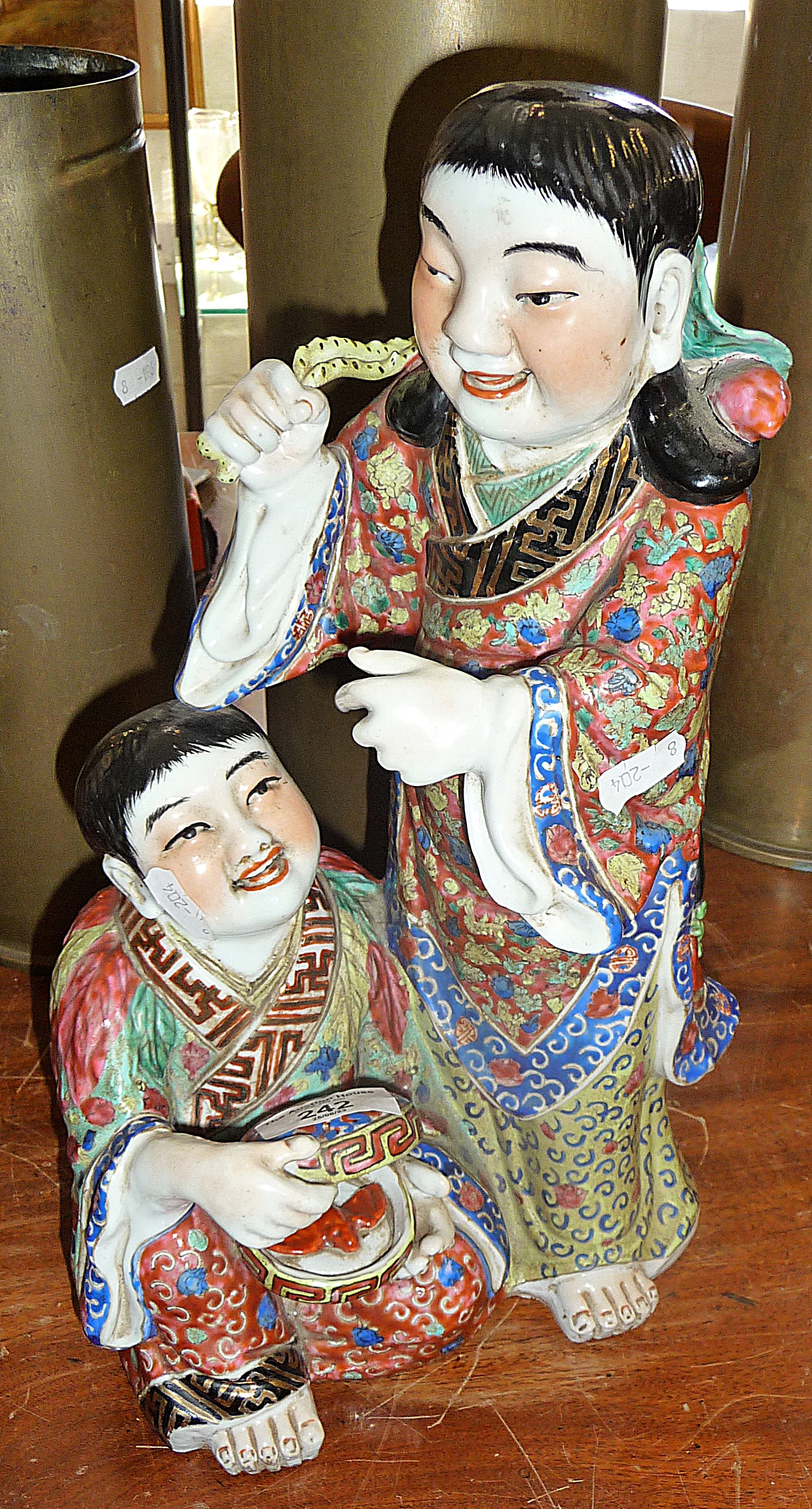 Chinese Famille Rose figures group, signed with impressed mark, 36cm high