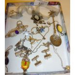 Various silver jewellery inc. charms, pendants, etc., and a silver souvenir spoon for Kampala