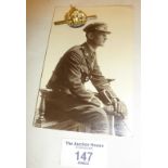 WW1 Dorsetshire Regiment enamel badge with postcard depicting the previous owner (from Bridport)