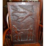 Naive carved wood panel of two pirates shaking hands