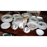 Large quantity of assorted Portmeirion pottery plates and bowls, inc. salt and pepper pots and