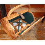 Round wicker picnic basket with contents