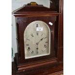 Edwardian mahogany table clock, silver dial, German movement striking on gongs, 18" tall