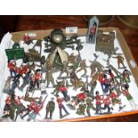 Diecast toy soldiers, inc. Britains search light, two guns, a Carden light carrier with drivers,