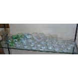 Large collection of drinking glasses, inc. champagne coupes and sundae glasses, etc.