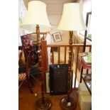 Two turned wood standard lamps