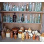 Large quantity of stoneware and glass bottles, etc.