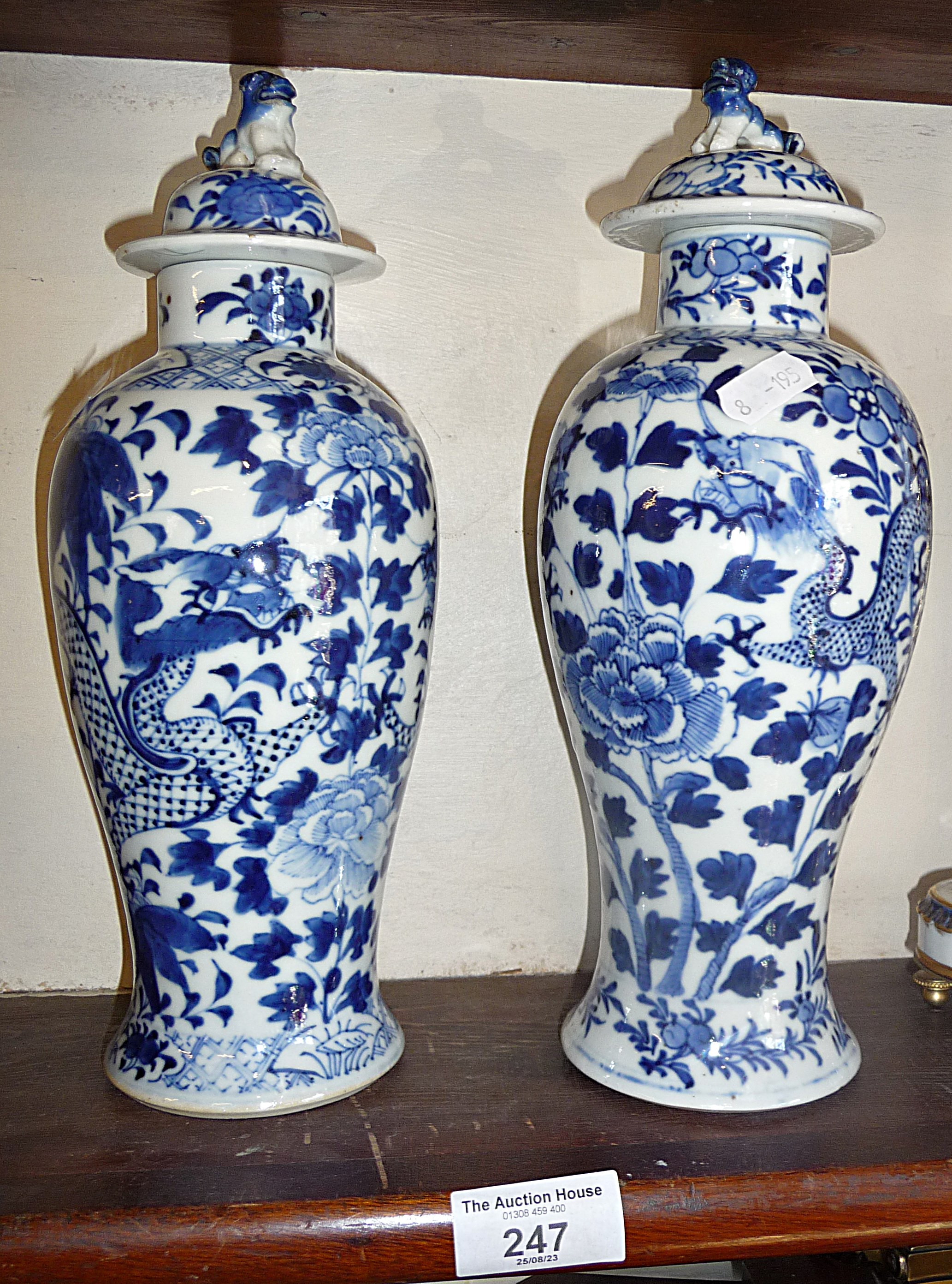 Pair of blue and white dragon vases with covers, 4 character marks, 26cm