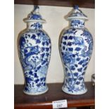 Pair of blue and white dragon vases with covers, 4 character marks, 26cm