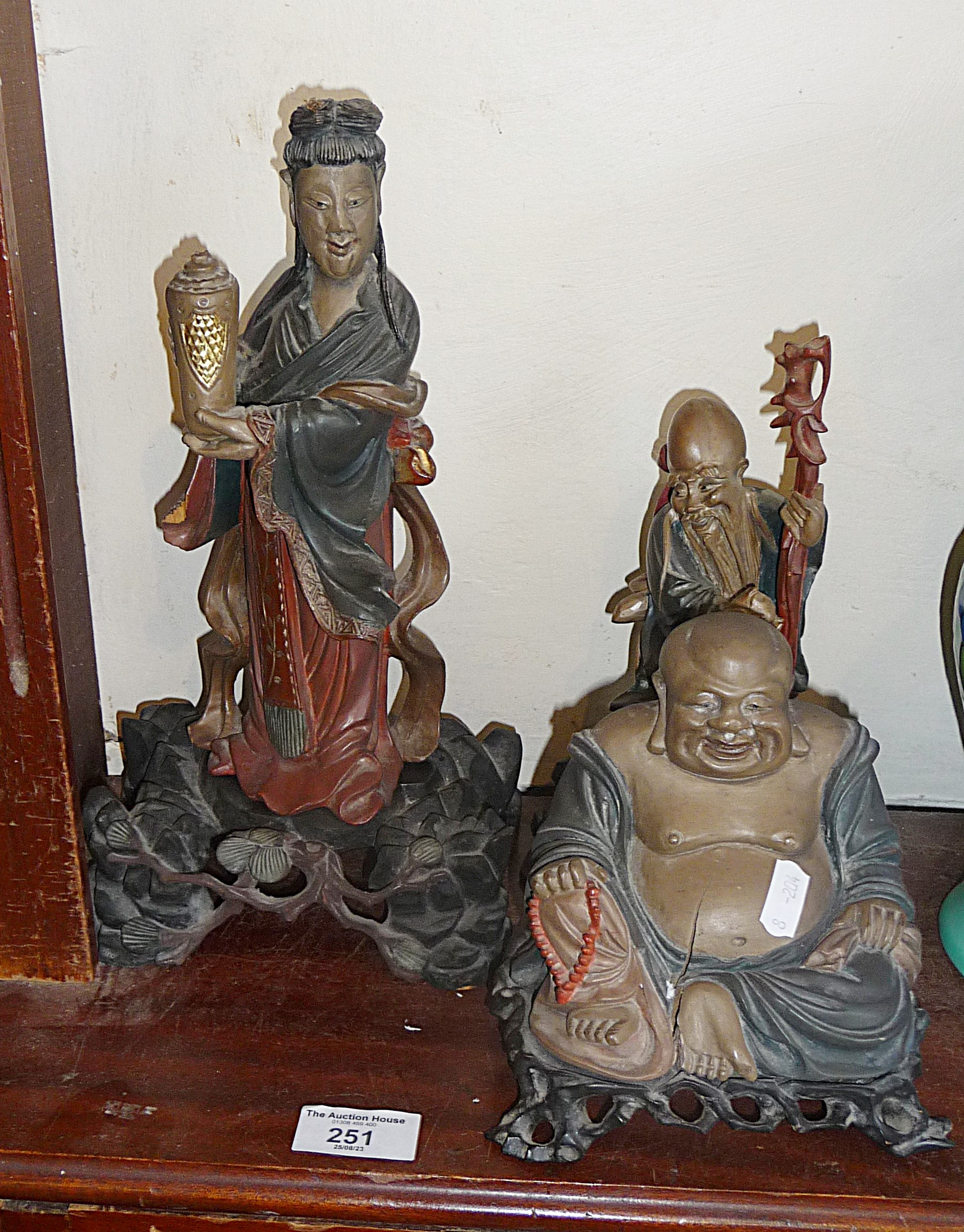 Three fine Chinese carved wood and lacquer figures