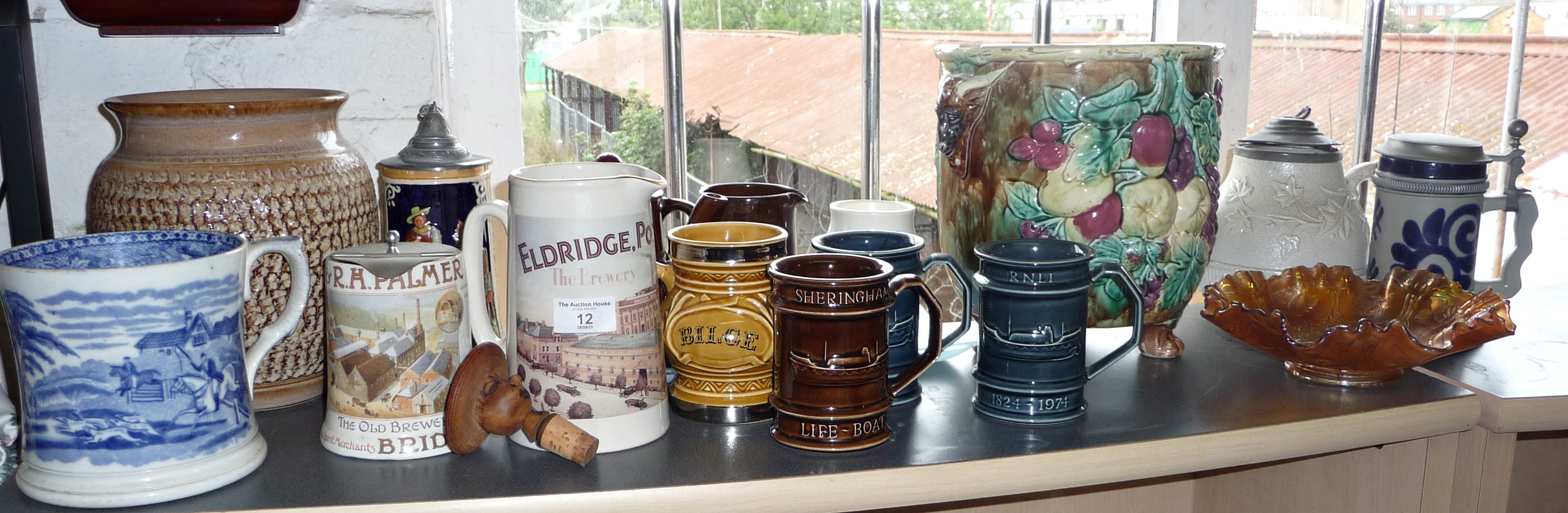 Majolica pottery jardiniere, brewery jugs, steins and other pottery, etc.