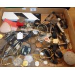 Wrist watches, coins, silver retractable toothpick, badges, pens, etc.