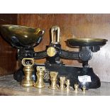 Iron and brass kitchen scales with brass bell weights