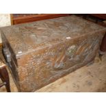 Heavily carved Oriental camphor wood chest