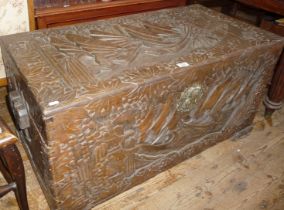 Heavily carved Oriental camphor wood chest