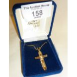 14ct Imperial gold articulated crucifix pendant on 9ct gold chain. Cross approx. 3.5g, and chain 1g