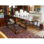 18th c. refectory style drawleaf table on bold carved legs with stretcher and carved frieze. Approx.