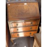 Walnut veneered bureau on cabriole legs