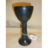 Tall blue oxide glazed studio pottery chalice attributed to Lucie Rie, with monogram and 1957