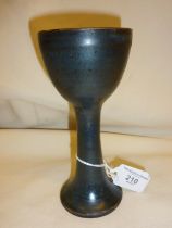 Tall blue oxide glazed studio pottery chalice attributed to Lucie Rie, with monogram and 1957