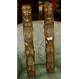 Pair of old carved wood brackets with faces and fruits