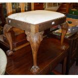Victorian carved walnut stool having drop-in seat on carved cabriole legs with ball and claw feet