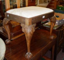 Victorian carved walnut stool having drop-in seat on carved cabriole legs with ball and claw feet