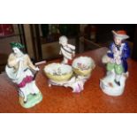 Meissen porcelain salt with two bowls flanking a putti figure (A/F), blue painted mark to base, with