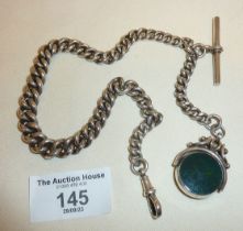 Antique silver graduated watch chain hung with a silver bloodstone spinner fob. Approx. weight 70g.