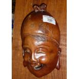 Indonesian carved and polished hardwood wall face mask