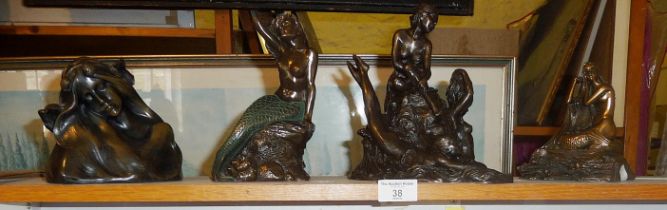 Four various bronzed figures, inc. mermaids