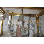 Three Lladro porcelain figural table lamps and four various figures (some A/F)