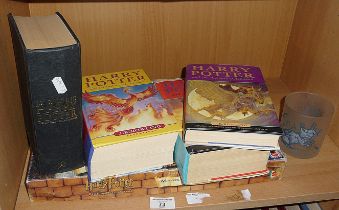 Harry Potter Mystery at Hogwarts game, a Scabbers frosted tumbler and four Harry Potter books,