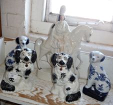 Pair of Staffordshire spaniels, a Staffordshire flatback of horse and rider and two other dogs
