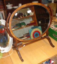 Oval mahogany framed toilet mirror