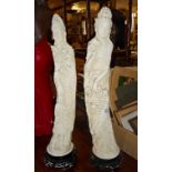 Pair of tall plaster figures of a Chinese man and woman