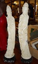 Pair of tall plaster figures of a Chinese man and woman