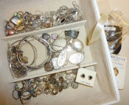 Good quantity of silver jewellery. inc. earrings, bangles, lockets, necklaces, etc.