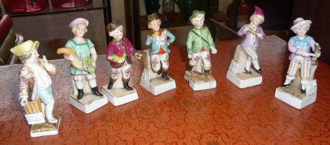 Seven German 19th c. porcelain "months" figurines (A/F), inc. one Meissen