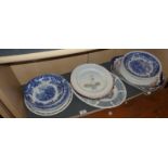 Assorted china dinner plates and platters