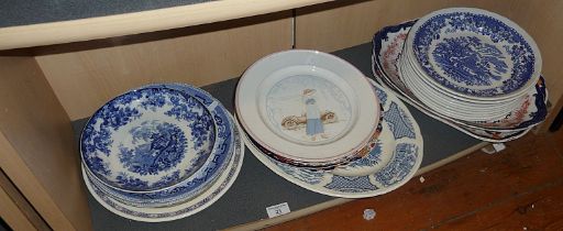 Assorted china dinner plates and platters