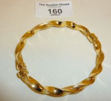 9ct hollow gold hinged bangle bracelet, approx. 8.5g