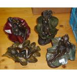 Four Heredities bronzed figures of naked ladies reclining in leaves
